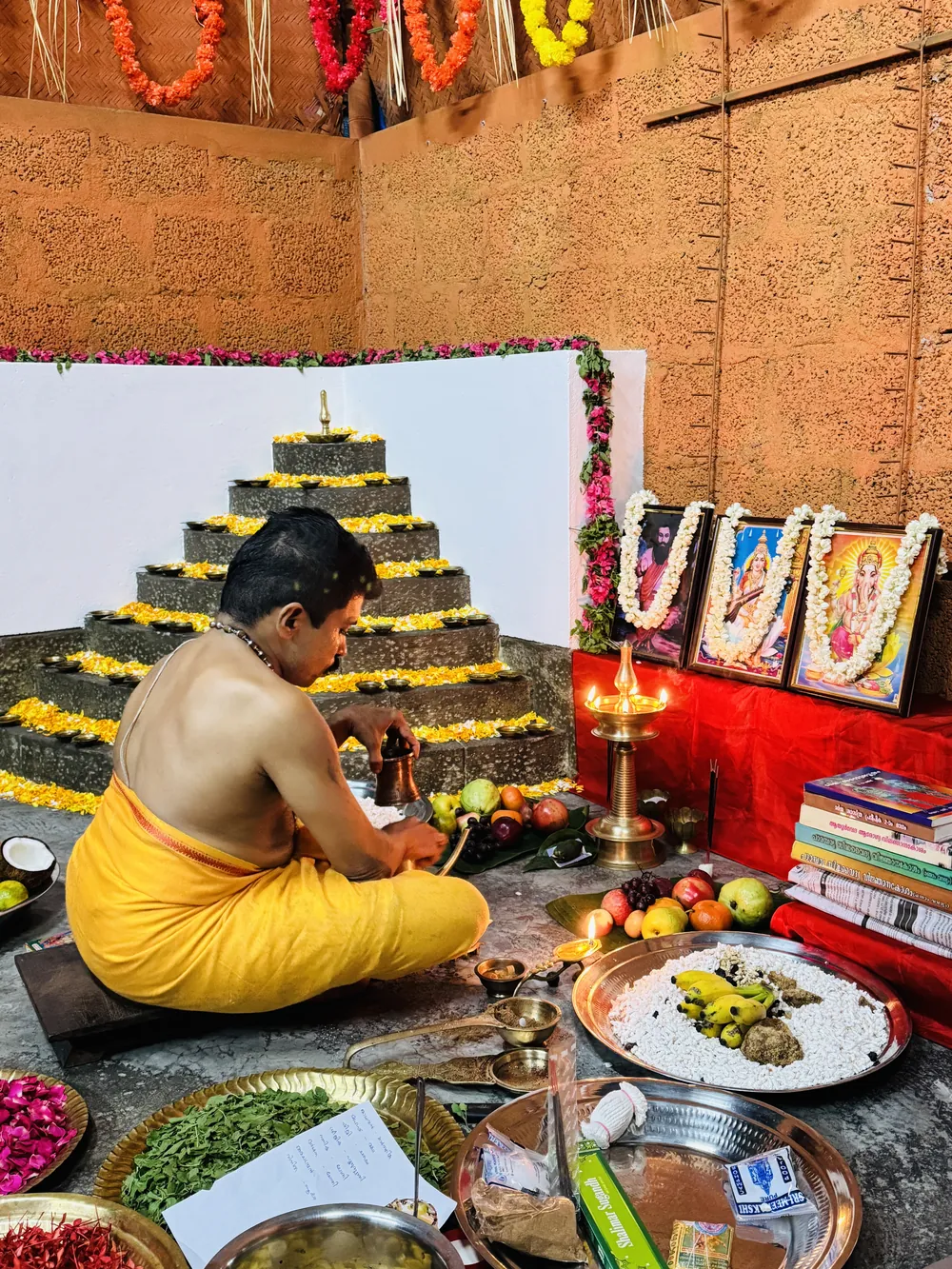 Pooja before the poothara with a lit nilavilakku at Sree Rudra Kalari, Tripunithura